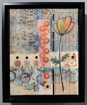 Mixed media collage in black floater frame.