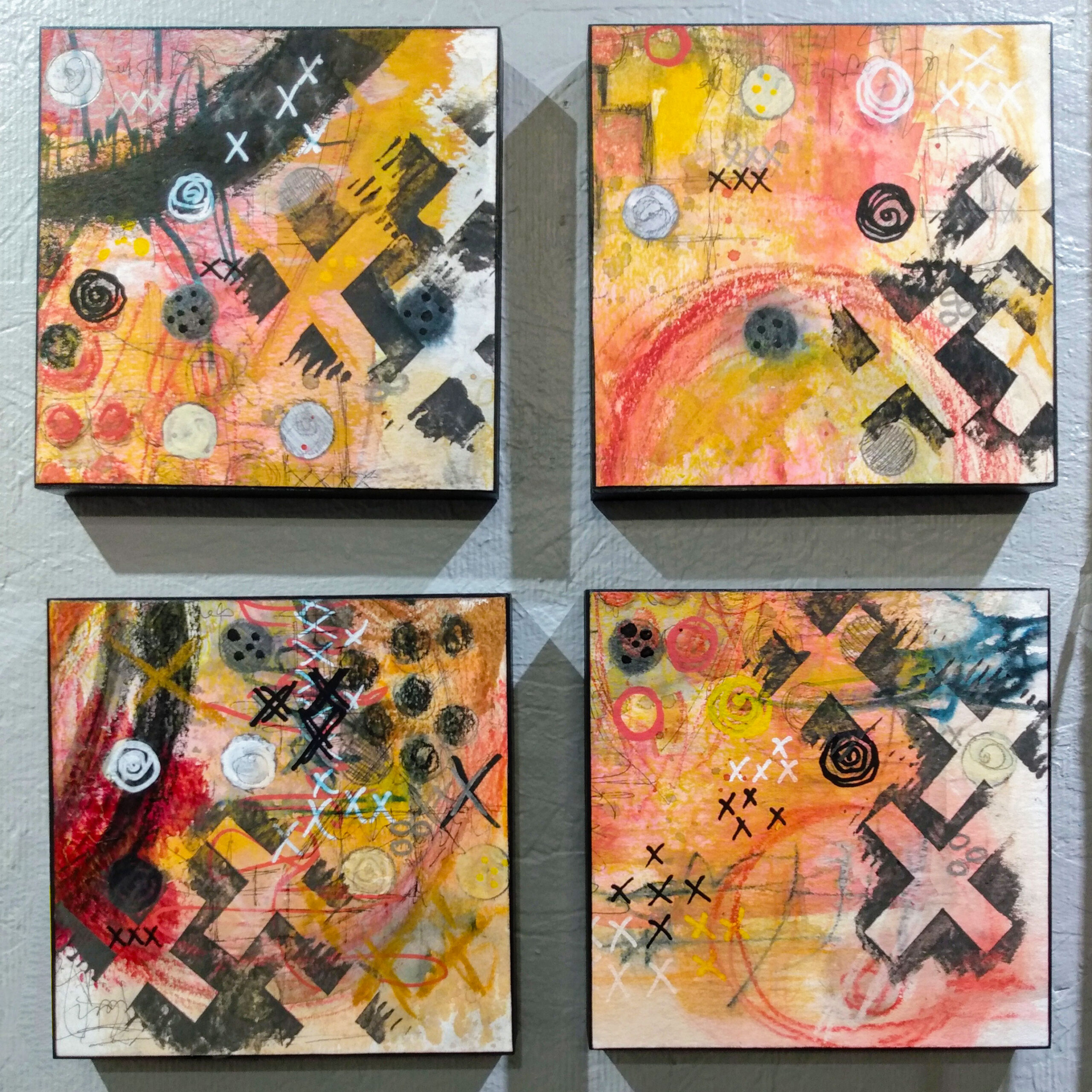 4 piece mixed media abstract painting in reds, white, gold, and black.