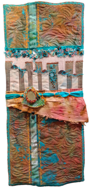 Machine pieced and quilted wall hanging with raw edges to fabrics.